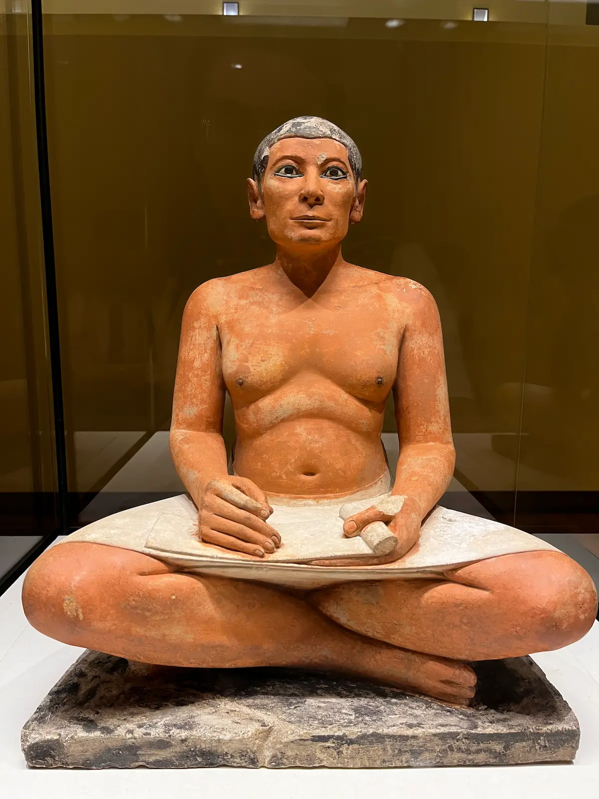 The Seated Scribe, an Egyptian statue in the Louvre